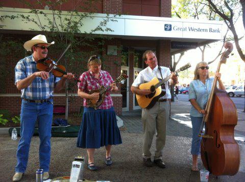 THE McDAILEY TRIO with fiddler Clarke Wright, playing for the “Streetmosphere” Arts program in downtown Fort Collins CO